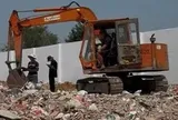 Khởi tố 6 bị can trong đường dây đổ trái phép gần 800 tấn chất thải xây dựng