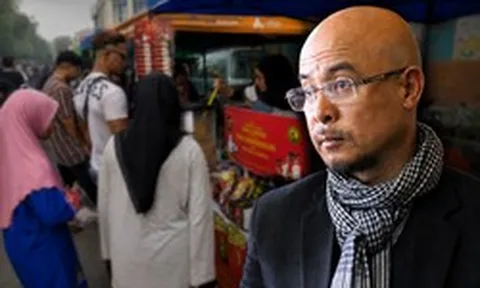 Cảnh tượng tại quầy hàng bán cà phê của ông Đặng Lê Nguyên Vũ ở Malaysia