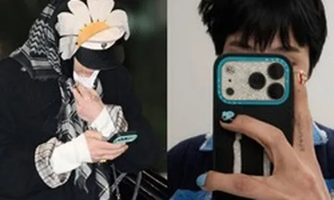 G-Dragon kéo khẩu trang mở khóa iPhone ở sân bay, zoom cận mới phát hiện món đồ độc nhất thế giới trên tay