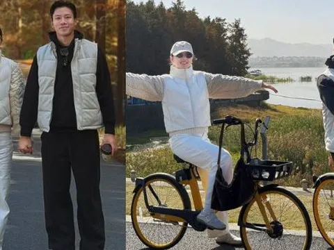 Đội trưởng tuyển Việt Nam nắm tay vợ Hoa khôi đại học Vinh viral khắp cõi mạng, vibe ngoài 30 vẫn quá đẹp, quá tình