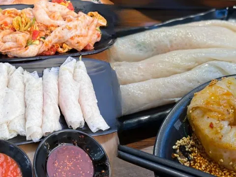 Cuộc so găng thú vị: Bánh cuốn Việt Nam và bánh cuốn Tử Trường, bên thanh tao nước mắm, bên đậm đà sốt cay